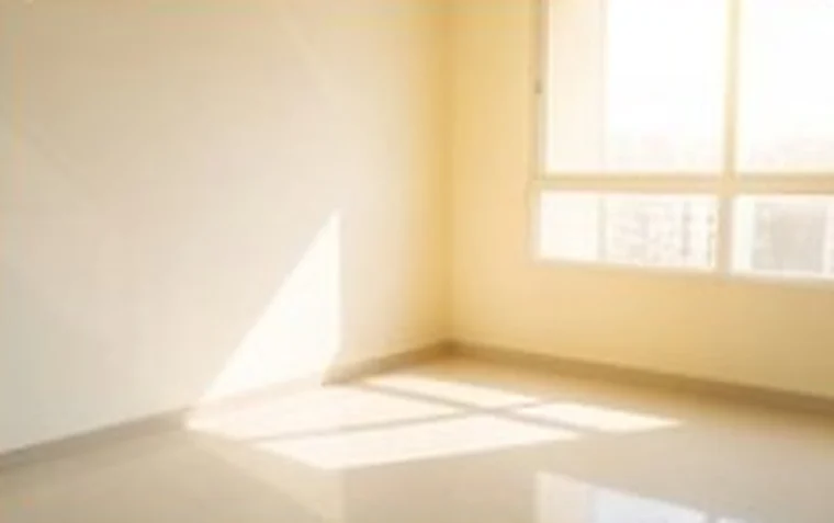 The same room after deep cleaning, with clean walls and sunlight on a polished floor